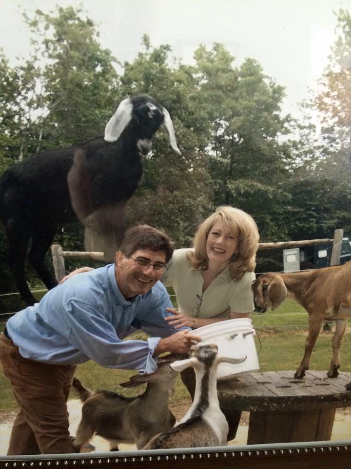 Child smelling flower
